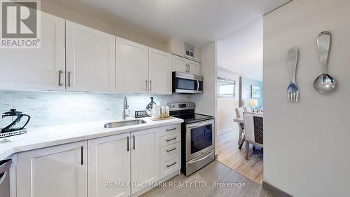 608 - 2500 Bridletowne Circle, Toronto, ON - Indoor Photo Showing Kitchen