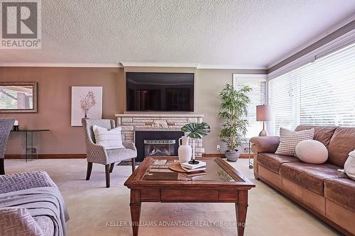 39 Heathfield Drive, Toronto, ON - Indoor Photo Showing Living Room With Fireplace