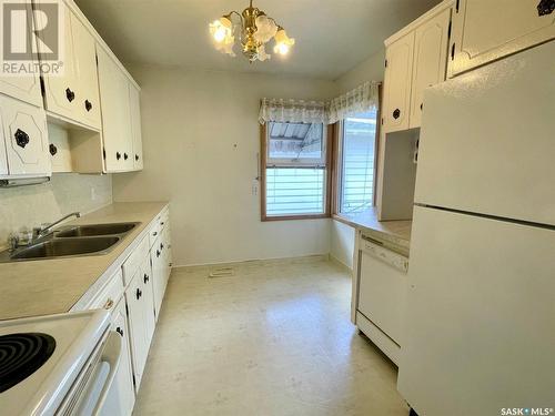 1153 Main Street N, Moose Jaw, SK - Indoor Photo Showing Kitchen With Double Sink