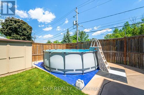 52 Adam Street, Cambridge, ON - Outdoor With Above Ground Pool