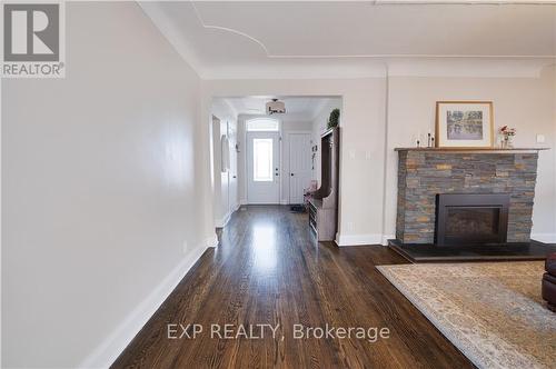 316 Barton Street, Hamilton, ON - Indoor Photo Showing Living Room With Fireplace