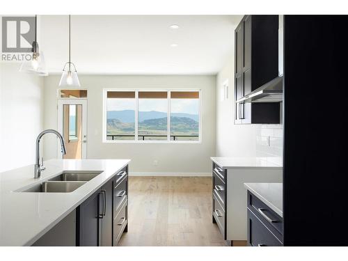 595 Vineyard Way N Unit# 11, Vernon, BC - Indoor Photo Showing Kitchen With Double Sink