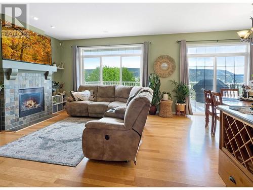 128 375 Mandarino Place, Williams Lake, BC - Indoor Photo Showing Living Room With Fireplace