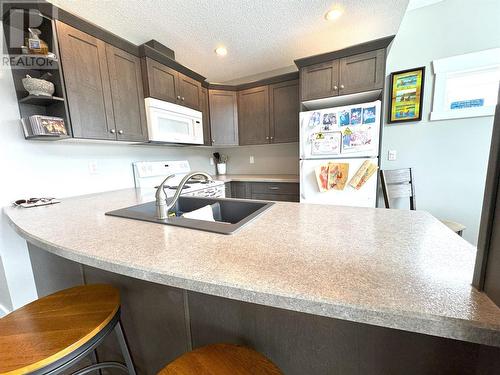 6862 Madrid Way, Kelowna, BC - Indoor Photo Showing Kitchen With Double Sink