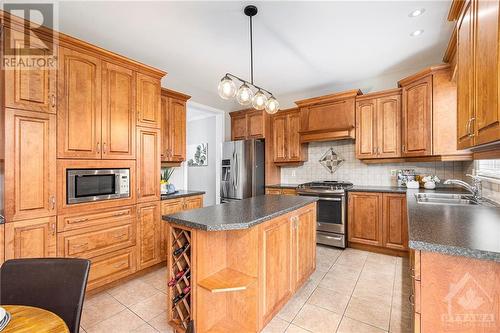 94 Hartsmere Drive, Stittsville, ON - Indoor Photo Showing Kitchen With Stainless Steel Kitchen With Double Sink