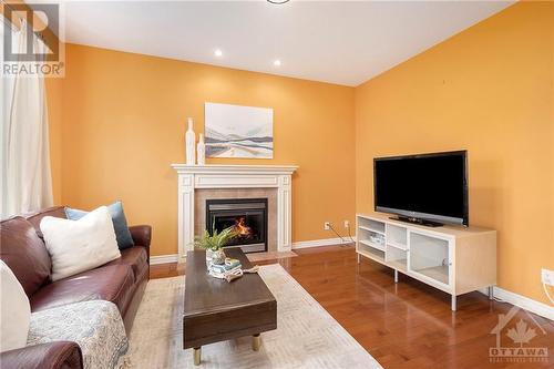 94 Hartsmere Drive, Stittsville, ON - Indoor Photo Showing Living Room With Fireplace