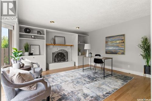 2030 Braun Bay E, Regina, SK - Indoor With Fireplace