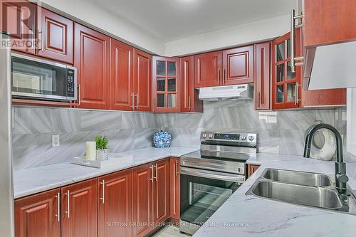 102 Paradelle Crescent, Toronto, ON - Indoor Photo Showing Kitchen With Double Sink