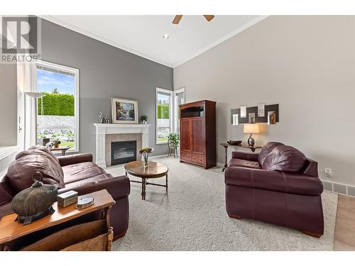 4631 Crawford Court, Kelowna, BC - Indoor Photo Showing Living Room With Fireplace