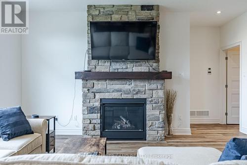 3 - 121 Robin Ridge Drive, Central Elgin (Belmont), ON - Indoor Photo Showing Living Room With Fireplace