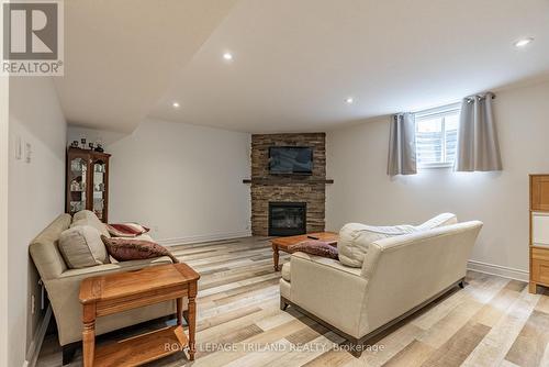 3 - 121 Robin Ridge Drive, Central Elgin, ON - Indoor Photo Showing Living Room With Fireplace