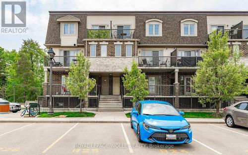 E - 235 Rachel Crescent, Kitchener, ON - Outdoor With Balcony With Facade