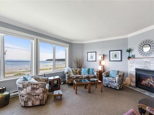 206-3132 Island Hwy West, Qualicum Beach, BC - Indoor Photo Showing Living Room With Fireplace