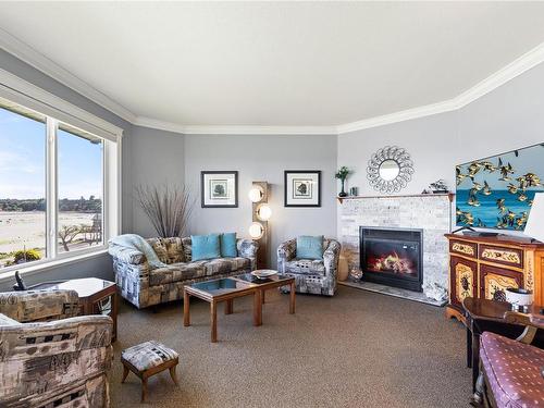 206-3132 Island Hwy West, Qualicum Beach, BC - Indoor Photo Showing Living Room With Fireplace