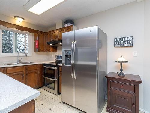 6550 Throup Rd, Sooke, BC - Indoor Photo Showing Kitchen With Double Sink