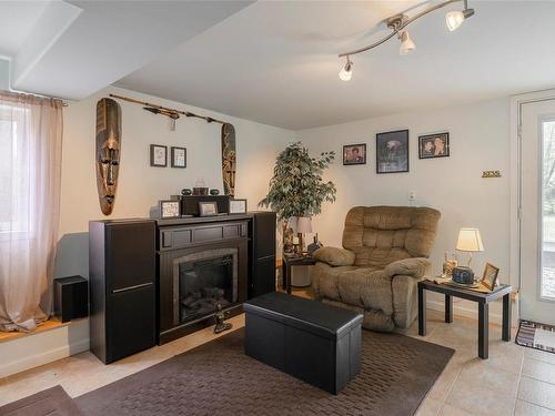 4297 Princess Rd, Port Alberni, BC - Indoor Photo Showing Other Room With Fireplace