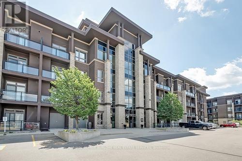 322 - 5010 Corporate Drive, Burlington, ON - Outdoor With Balcony With Facade