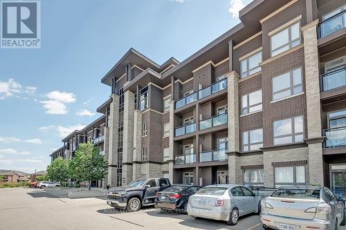 322 - 5010 Corporate Drive, Burlington, ON - Outdoor With Balcony With Facade