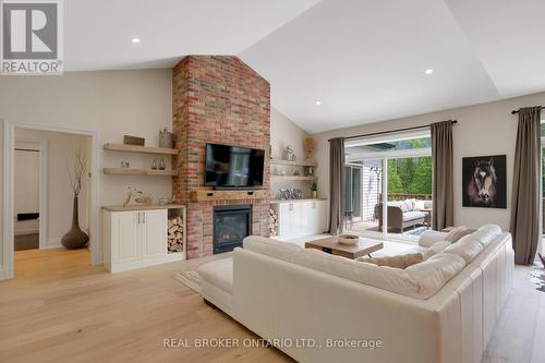 877 Pine Avenue, Innisfil, ON - Indoor Photo Showing Living Room With Fireplace