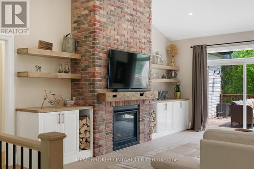 877 Pine Avenue, Innisfil, ON - Indoor Photo Showing Living Room With Fireplace