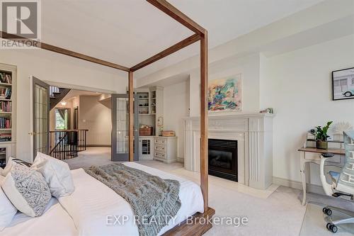 13 Balmoral Avenue, Toronto, ON - Indoor Photo Showing Bedroom With Fireplace