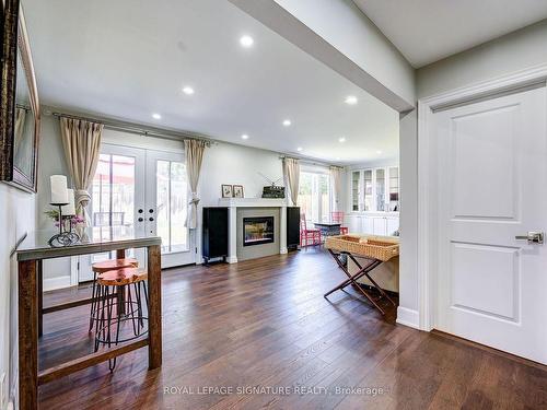 116 Alamosa Dr, Toronto, ON - Indoor Photo Showing Other Room With Fireplace