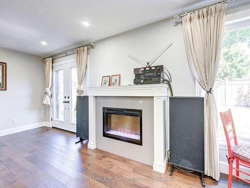 116 Alamosa Dr, Toronto, ON - Indoor Photo Showing Living Room With Fireplace