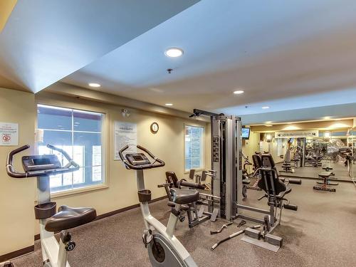 209-1093 Sunset Drive, Kelowna, BC - Indoor Photo Showing Gym Room