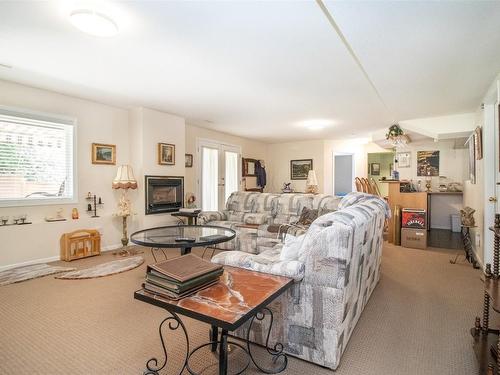 3149 Shetler Drive, Westbank, BC - Indoor Photo Showing Living Room With Fireplace