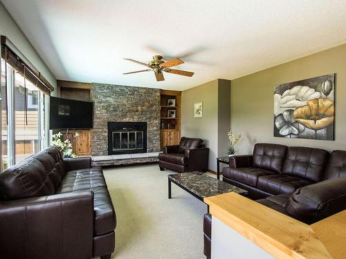 2430 Fairhall Road, Kelowna, BC - Indoor Photo Showing Living Room With Fireplace