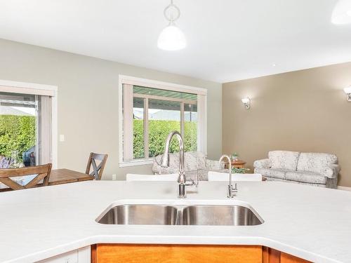 18-6450 Okanagan Landing Road, Vernon, BC - Indoor Photo Showing Kitchen With Double Sink