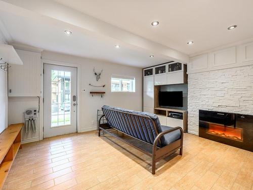 Living room - 131 Rue De Lévis, Bromont, QC - Indoor With Fireplace