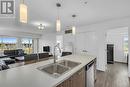 775 Academy Way Unit# 208, Kelowna, BC  - Indoor Photo Showing Kitchen With Double Sink 