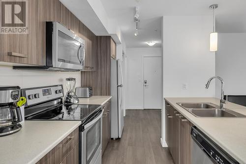 775 Academy Way Unit# 208, Kelowna, BC - Indoor Photo Showing Kitchen With Stainless Steel Kitchen With Double Sink With Upgraded Kitchen