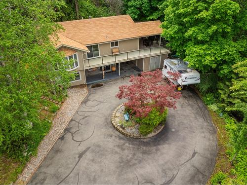 125 Mill Road, Fruitvale, BC - Outdoor With Deck Patio Veranda