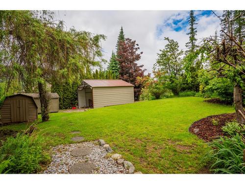 125 Mill Road, Fruitvale, BC - Outdoor With Backyard