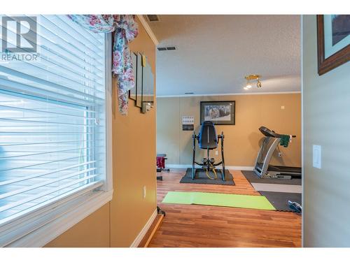 125 Mill Road, Fruitvale, BC - Indoor Photo Showing Gym Room