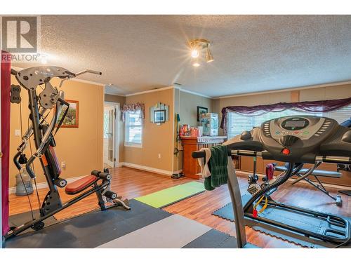 125 Mill Road, Fruitvale, BC - Indoor Photo Showing Gym Room