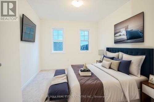 10 - 60 Cosmopolitan Common Street, St. Catharines, ON - Indoor Photo Showing Bedroom