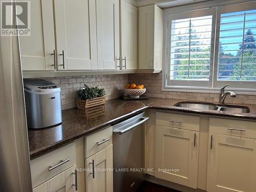 6 - 30 Laguna Parkway, Ramara (Brechin), ON - Indoor Photo Showing Kitchen With Double Sink