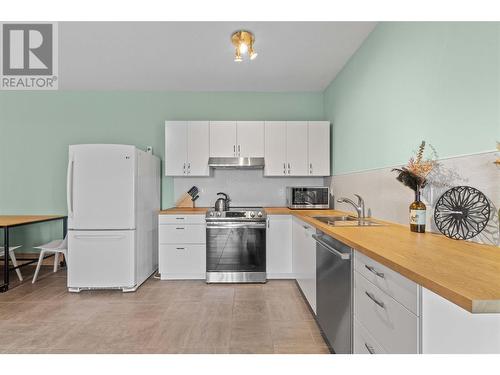 4519 June Springs Road, Kelowna, BC - Indoor Photo Showing Kitchen With Double Sink