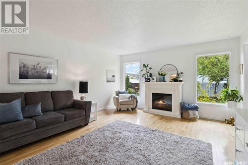 503 Cochin Way, Saskatoon, SK - Indoor Photo Showing Living Room With Fireplace