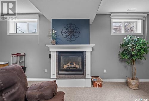 2 Poplar Bay, Birch Hills, SK - Indoor Photo Showing Living Room With Fireplace