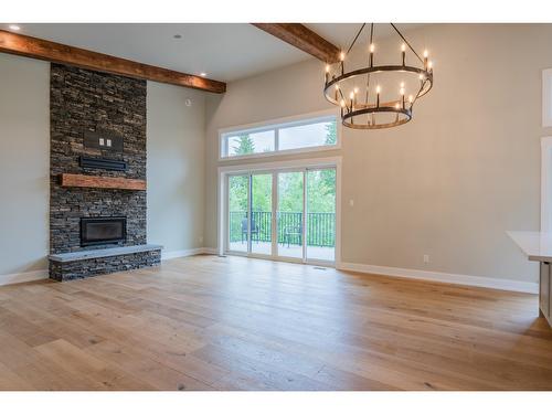 695 Killough Road, Castlegar, BC - Indoor Photo Showing Living Room With Fireplace