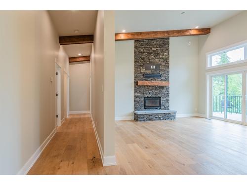 695 Killough Road, Castlegar, BC - Indoor Photo Showing Living Room With Fireplace