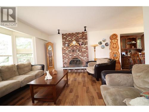 7607 St Mark Crescent, Prince George, BC - Indoor Photo Showing Living Room With Fireplace