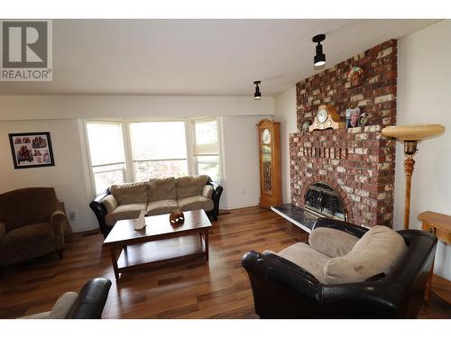 7607 St Mark Crescent, Prince George, BC - Indoor Photo Showing Living Room With Fireplace