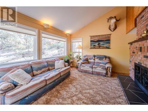 3815 Forsyth Drive, Penticton, BC - Indoor Photo Showing Living Room With Fireplace