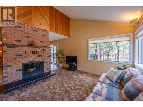 3815 Forsyth Drive, Penticton, BC - Indoor Photo Showing Living Room With Fireplace