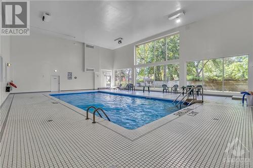 260 Brittany Drive Unit#404, Ottawa, ON - Indoor Photo Showing Other Room With In Ground Pool